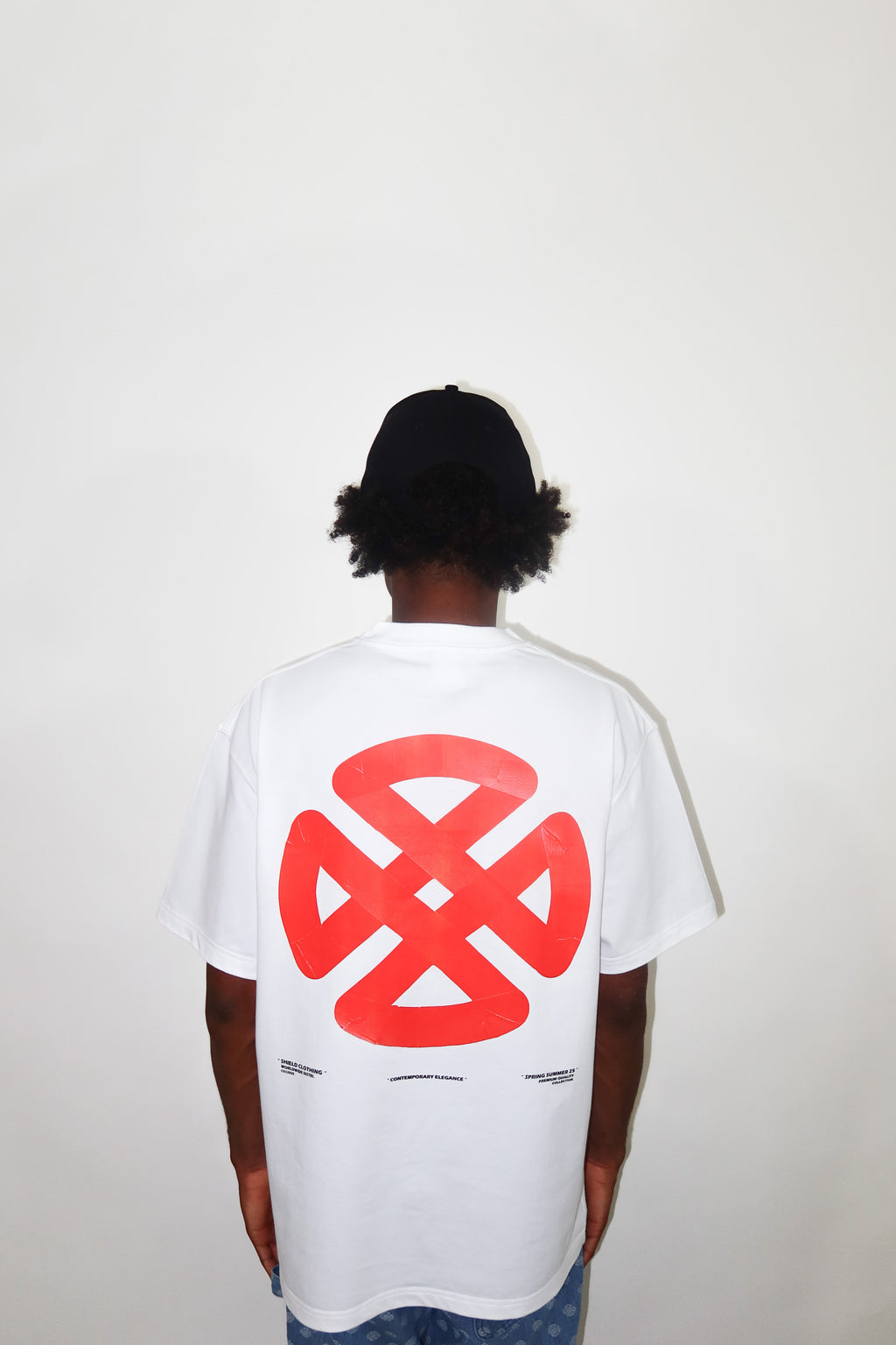 PAPER TAPE SHIELD TEE