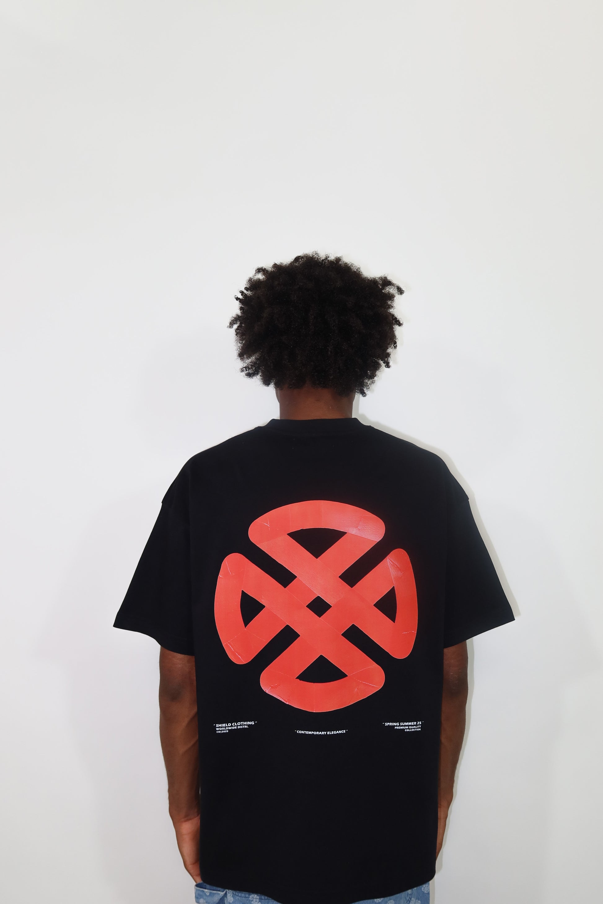 PAPER TAPE SHIELD TEE